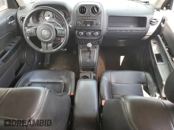 2014 Jeep Patriot High Altitude with VIN 1C4NJPFA3ED676843, listed as a Copart auction lot 49769215 with 122,606 mi miles and Salvage Title. Bid and sale history available at carsss.com. Image 8.