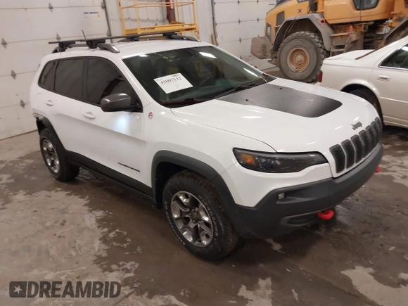 2019 Jeep Cherokee Trailhawk with VIN 1C4PJMBX4KD390061, listed as a IAAI auction lot 42007112 with 72,227 mi miles and . Bid and sale history available at DreamBid. Image 1.