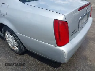 2003 Cadillac DeVille with VIN 1G6KD54Y63U115955, listed as a IAAI auction lot 41980561 with 176,624 mi miles. Bid and sale history available at carsss.com. Image 6.