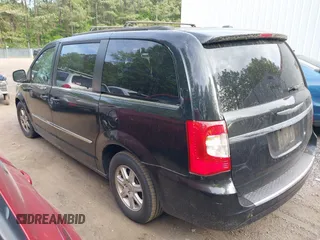 2012 Chrysler Town & Country Touring with VIN 2C4RC1BG7CR301101, listed as a IAAI auction lot 42173814 with 141,128 mi miles. Bid and sale history available at carsss.com. Image 3.