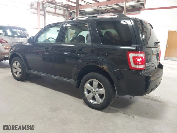 2011 Ford Escape Limited with VIN 1FMCU0EG0BKB30015, listed as a IAAI auction lot 41987953 with 203,057 mi miles. Bid and sale history available at carsss.com. Image 3.