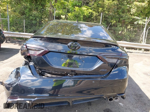 2022 Toyota Camry TRD with VIN 4T1KZ1AK2NU064511, listed as a IAAI auction lot 42176608 with 28,064 mi miles and . Bid and sale history available at DreamBid. Image 16.