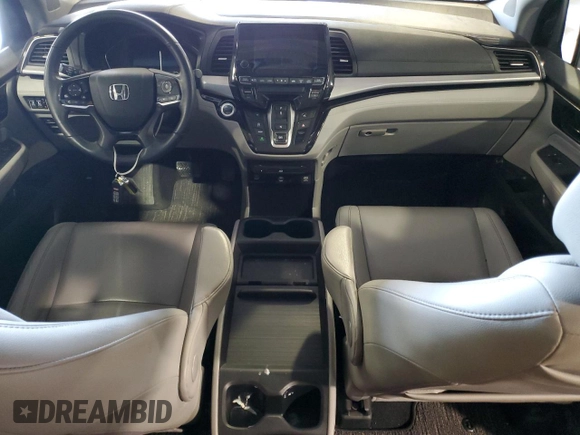 2021 Honda Odyssey Touring with VIN 5FNRL6H84MB009125, listed as a Copart auction lot 58248385 with 55,360 mi miles and Salvage title. Bid and sale history available at DreamBid. Image 8.
