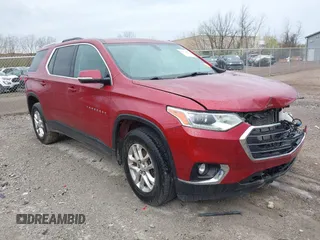 2018 Chevrolet Traverse LT Cloth z VIN 1GNERGKW1JJ195342, wystawiony jako IAAI lot #42079079 z przebiegiem 88 473 mil mil oraz . Historia ofert i sprzedaży dostępna na DreamBid. Obrazek 1.