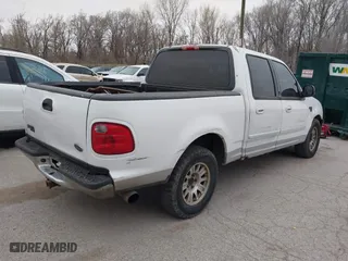 2001 Ford F-150 SuperCrew XLT with VIN 1FTRW07L61KB49220, listed as a IAAI auction lot 41826223 with 281,547 mi miles. Bid and sale history available at carsss.com. Image 4.