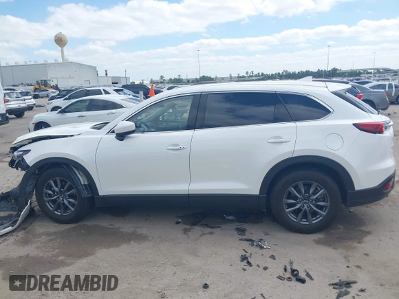 2022 Mazda CX-9 Touring with VIN JM3TCBCY0N0608052, listed as a IAAI auction lot 42027465 with 65,313 mi miles and . Bid and sale history available at DreamBid. Image 14.