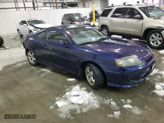 2006 Hyundai Tiburon GS with VIN KMHHM65D66U230533, listed as a Copart auction lot 87877565 with 155,039 mi miles and Non Repairable. Bid and sale history available at carsss.com. Image 4.