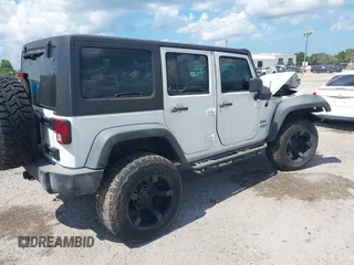 2016 Jeep Wrangler Unlimited Sport with VIN 1C4BJWDGXGL335825, listed as a IAAI auction lot 28960589 with 28,515 mi miles and . Bid and sale history available at DreamBid. Image 4.
