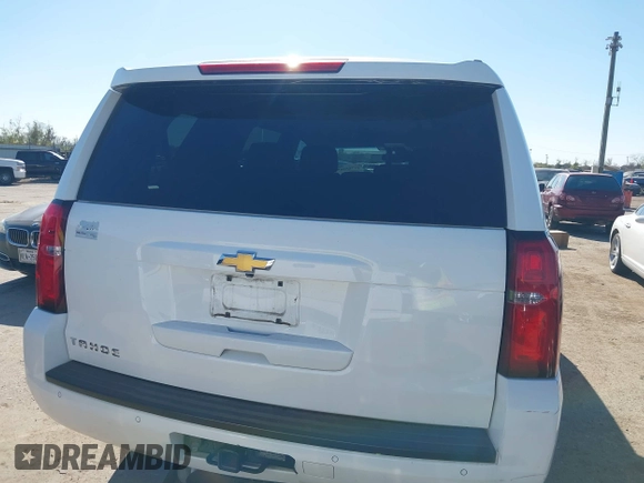 2015 Chevrolet Tahoe LS with VIN 1GNSCAKCXFR748554, listed as a IAAI auction lot 41765865 with 160,282 mi miles and . Bid and sale history available at DreamBid. Image 16.