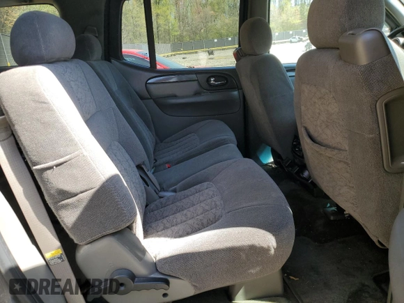 2004 GMC Envoy SLT with VIN 1GKET16S046155005, listed as a Copart auction lot 53554505 with 184,039 mi miles and Salvage Title. Bid and sale history available at DreamBid. Image 11.