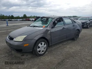 2007 Ford Focus S z VIN 1FAFP34NX7W317259, wystawiony jako Copart lot #52158405 z przebiegiem 206 602 mil mil oraz Szkoda całkowita • Salvage title. Historia ofert i sprzedaży dostępna na DreamBid. Obrazek 1.