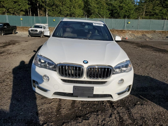 2017 BMW X5 xDrive40e iPerformance with VIN 5UXKT0C50H0S79726, listed as a Copart auction lot 48129805 with 64,853 mi miles and Salvage Title. Bid and sale history available at carsss.com. Image 5.