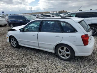 2002 Mazda Protege z VIN JM1BJ245721470434, wystawiony jako Copart lot #57293765 z przebiegiem 144 622 mil mil oraz Szkoda całkowita • Salvage title. Historia ofert i sprzedaży dostępna na DreamBid. Obrazek 2.