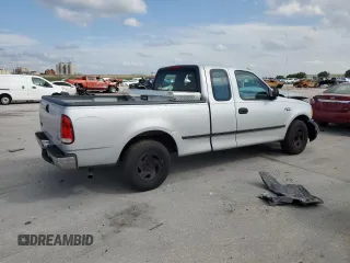 1999 Ford F-150 with VIN 1FTZX1729XNB67194, listed as a Copart auction lot 58383345 with Not provided miles and Salvage title. Bid and sale history available at DreamBid. Image 3.
