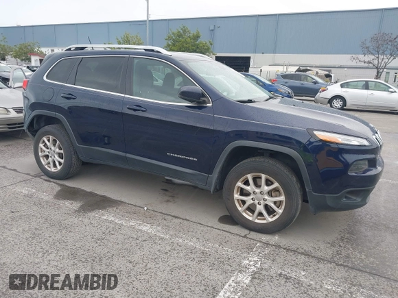 2015 Jeep Cherokee Latitude with VIN 1C4PJMCS2FW538575, listed as a IAAI auction lot 41799474 with 88,197 mi miles and . Bid and sale history available at DreamBid. Image 1.
