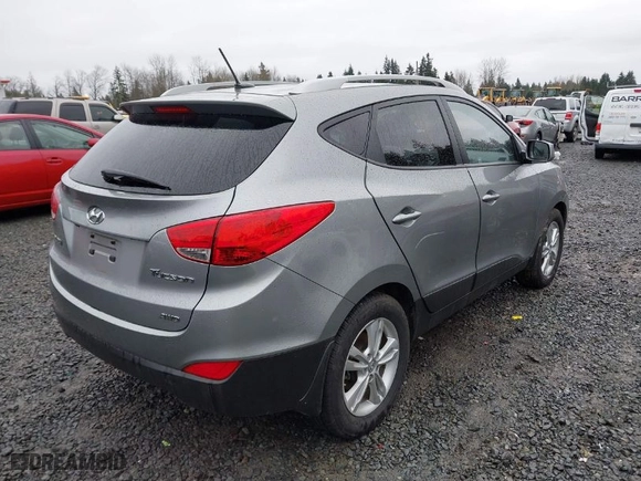 2011 Hyundai Tucson Limited with VIN KM8JUCAC7BU315680, listed as a IAAI auction lot 41577234 with 32,558 mi miles. Bid and sale history available at carsss.com. Image 4.