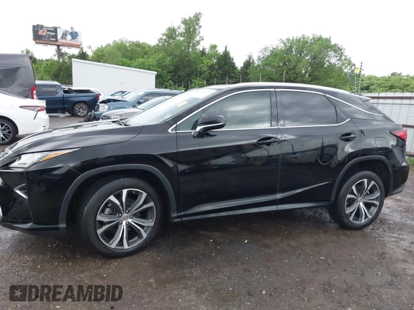 2016 Lexus RX 350 z VIN 2T2ZZMCA6GC005692, wystawiony jako IAAI lot #42147337 z przebiegiem 132 363 mil mil oraz . Historia ofert i sprzedaży dostępna na DreamBid. Obrazek 14.