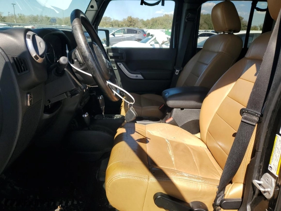 2011 Jeep Wrangler Unlimited Sahara with VIN 1J4HA5H1XBL619601, listed as a Copart auction lot 47041385 with 139,713 mi miles and Clean Title. Bid and sale history available at carsss.com. Image 7.