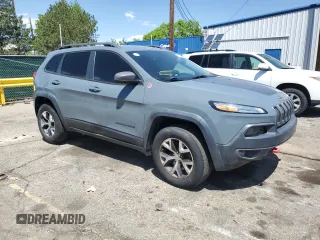 2014 Jeep Cherokee Trailhawk z VIN 1C4PJMBBXEW134939, wystawiony jako Copart lot #56579125 z przebiegiem 155 693 mil mil oraz Czysty tytuł • Clean title. Historia ofert i sprzedaży dostępna na DreamBid. Obrazek 4.
