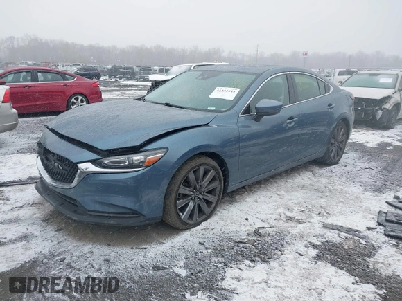 2018 Mazda 6 Grand Touring with VIN JM1GL1TY5J1330614, listed as a IAAI auction lot 41354444 with 100,744 mi miles and . Bid and sale history available at DreamBid. Image 17.
