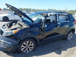 2015 Kia Sportage LX with VIN KNDPB3AC6F7707946, listed as a IAAI auction lot 41798289 with Not Provided miles and . Bid and sale history available at carsss.com. Image 6.