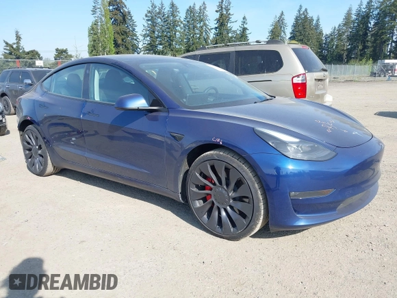 2023 Tesla Model 3 Performance with VIN 5YJ3E1EC2PF679613, listed as a IAAI auction lot 42099199 with 21,721 mi miles. Bid and sale history available at carsss.com. Image 1.