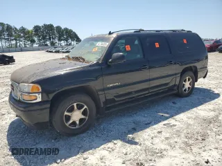 2006 GMC Yukon XL with VIN 1GKFK66U46J165428, listed as a Copart auction lot 52756205 with Not provided miles and Salvage title. Bid and sale history available at DreamBid. Image 1.