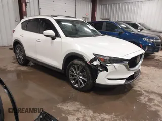 2019 Mazda CX-5 Signature with VIN JM3KFBEY5K0520593, listed as a IAAI auction lot 41638594 with 111,504 mi miles. Bid and sale history available at carsss.com. Image 1.