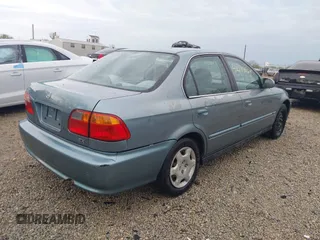 2000 Honda Civic EX z VIN 1HGEJ8644YL006150, wystawiony jako IAAI lot #42149964 z przebiegiem 195 489 mil mil oraz . Historia ofert i sprzedaży dostępna na DreamBid. Obrazek 4.