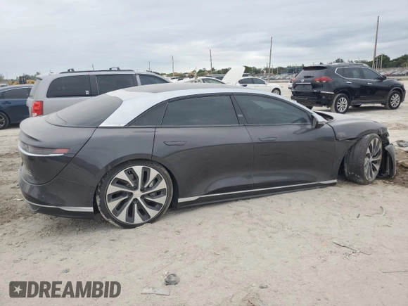 2023 Lucid Air Grand Touring z VIN 50EA1GBA8PA001431, wystawiony jako Copart lot #75683014 z przebiegiem 12 117 mil mil oraz Szkody całkowita. Historia ofert i sprzedaży dostępna na DreamBid. Obrazek 3.
