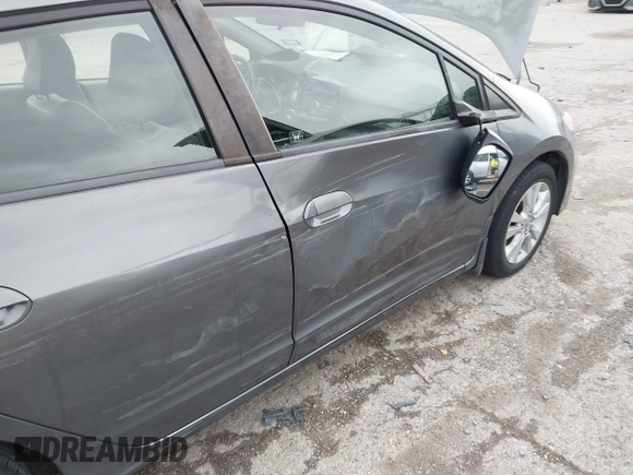 2012 Honda Insight EX with VIN JHMZE2H79CS004299, listed as a IAAI auction lot 42296207 with 170,288 mi miles and . Bid and sale history available at DreamBid. Image 6.