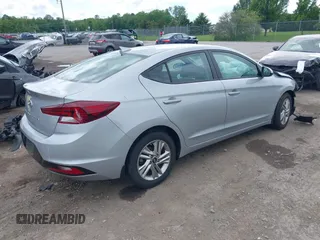 2020 Hyundai Elantra Value Edition z VIN KMHD84LF0LU083231, wystawiony jako IAAI lot #42389540 z przebiegiem 14 338 mil mil oraz . Historia ofert i sprzedaży dostępna na DreamBid. Obrazek 4.