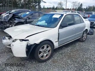 2002 Mazda Protege DX with VIN JM1BJ225520542854, listed as a IAAI auction lot 41955679 with 161,338 mi miles and . Bid and sale history available at DreamBid. Image 17.