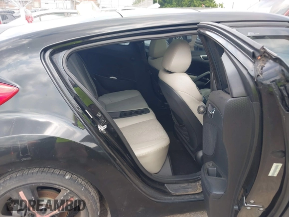 2013 Hyundai Veloster w/Black Int с VIN KMHTC6ADXDU084704, выставлен на аукционе IAAI как лот 42443297 с пробегом 111 587 миль миль и . История ставок и продаж доступна на DreamBid. Изображение 8.