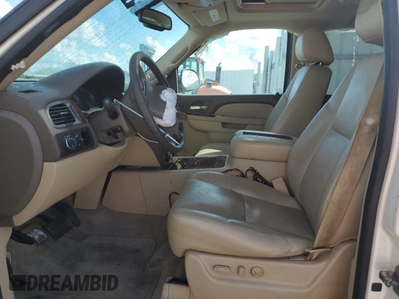 2012 Chevrolet Tahoe LTZ with VIN 1GNSCCE08CR214560, listed as a Copart auction lot 44723175 with 137,489 mi miles and Salvage title. Bid and sale history available at DreamBid. Image 7.
