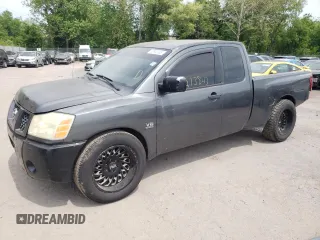2004 Nissan Titan SE z VIN 1N6AA06A44N505580, wystawiony jako Copart lot #77770743 z przebiegiem 219 649 mil mil oraz Szkoda całkowita • Salvage title. Historia ofert i sprzedaży dostępna na DreamBid. Obrazek 1.