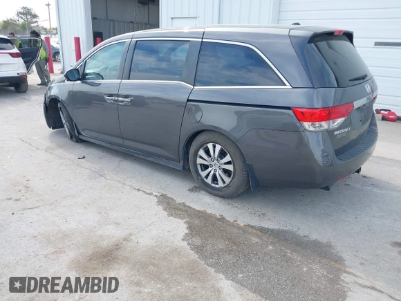 2014 Honda Odyssey EX-L with VIN 5FNRL5H67EB106183, listed as a IAAI auction lot 42210600 with 196,166 mi miles and . Bid and sale history available at DreamBid. Image 3.