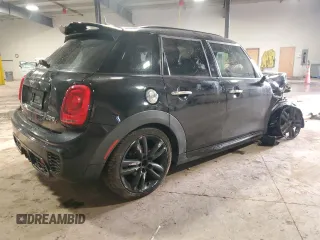 2015 MINI Hardtop 4 Door S with VIN WMWXU3C55F2B62019, listed as a Copart auction lot 46853535 with 124,919 mi miles and Salvage title. Bid and sale history available at DreamBid. Image 3.