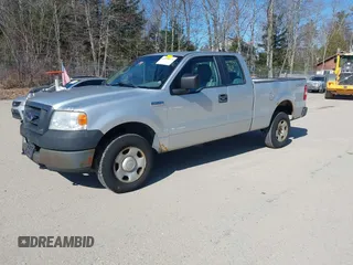 2005 Ford F-150 STX with VIN 1FTRX14W75FB45211, listed as a IAAI auction lot 41998529 with 325,970 mi miles. Bid and sale history available at carsss.com. Image 2.