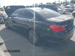 2012 BMW 7 Series 740i with VIN WBAKA4C5XCDS99253, listed as a IAAI auction lot 41710171 with 176,907 mi miles. Bid and sale history available at carsss.com. Image 3.