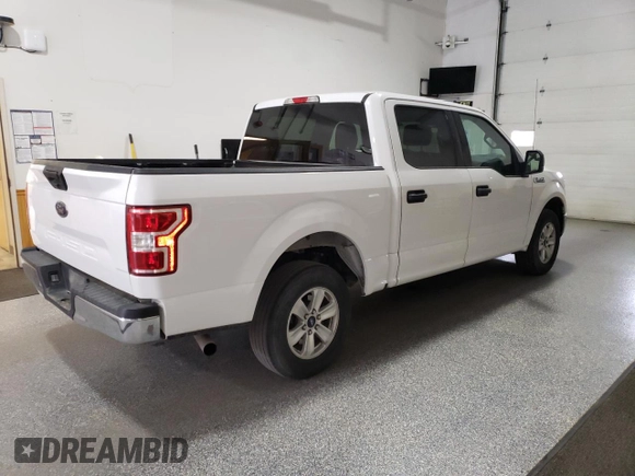2020 Ford F-150 XL with VIN 1FTEW1C54LFA22778, listed as a Copart auction lot 59738575 with 111,796 mi miles and Clean title. Bid and sale history available at DreamBid. Image 3.
