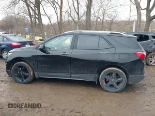 2021 Chevrolet Equinox Premier z VIN 2GNAXNEV4M6125086, wystawiony jako IAAI lot #41475387 z przebiegiem 53 387 mil mil oraz . Historia ofert i sprzedaży dostępna na DreamBid. Obrazek 14.