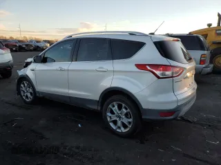 2016 Ford Escape Titanium with VIN 1FMCU9J97GUB28558, listed as a Copart auction lot 89022285 with 81,544 mi miles and Salvage Title. Bid and sale history available at DreamBid. Image 2.