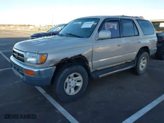 1997 Toyota 4Runner SR5 with VIN JT3HN86R8V0127809, listed as a IAAI auction lot 41345364 with 227,948 mi miles. Bid and sale history available at carsss.com. Image 2.