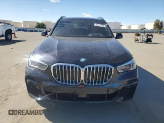 2023 BMW X5 xDrive45e with VIN 5UXTA6C03P9P44673, listed as a Copart auction lot 46477355 with 5,164 mi miles and Salvage Title. Bid and sale history available at carsss.com. Image 5.