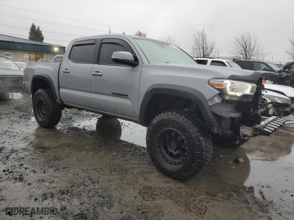 2019 Toyota Tacoma 4WD SR with VIN 3TMCZ5AN3KM256031, listed as a Copart auction lot 86110064 with 144,914 mi miles and Salvage Title. Bid and sale history available at carsss.com. Image 4.