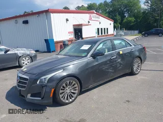 2014 Cadillac CTS Luxury AWD z VIN 1G6AX5SX7E0173466, wystawiony jako IAAI lot #42187266 z przebiegiem 115 140 mil mil oraz . Historia ofert i sprzedaży dostępna na DreamBid. Obrazek 2.