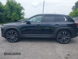 2023 Mazda CX-50 Meridian Edition with VIN 7MMVABXY1PN145913, listed as a IAAI auction lot 42632620 with 23,444 mi miles and . Bid and sale history available at DreamBid. Image 14.