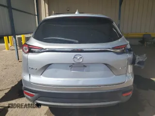 2017 Mazda CX-9 Touring с VIN JM3TCACY0H0141939, выставлен на аукционе Copart как лот 42557375 с пробегом 105 985 миль миль и Списание • Salvage title. История ставок и продаж доступна на DreamBid. Изображение 6.