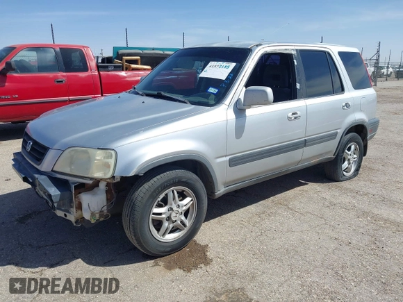 1999 Honda CR-V EX with VIN JHLRD1861XC025446, listed as a IAAI auction lot 41852155 with 201,598 mi miles. Bid and sale history available at carsss.com. Image 2.